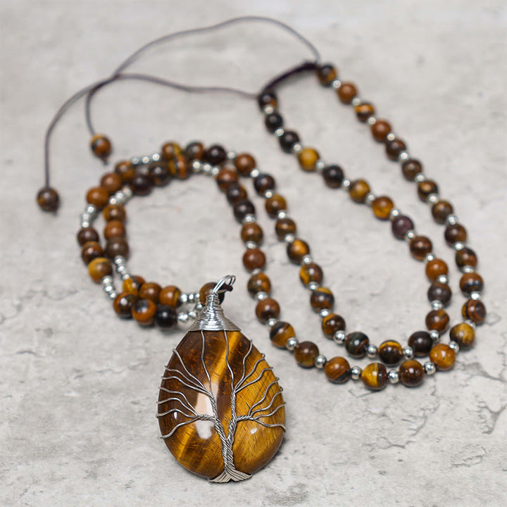 Collier avec pendentif en perles de force en œil de tigre naturel et Buddha Stones