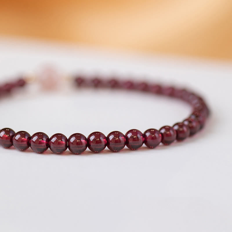 Bracelet calme en quartz fraise et grenat naturel de Buddha Stones - image 4