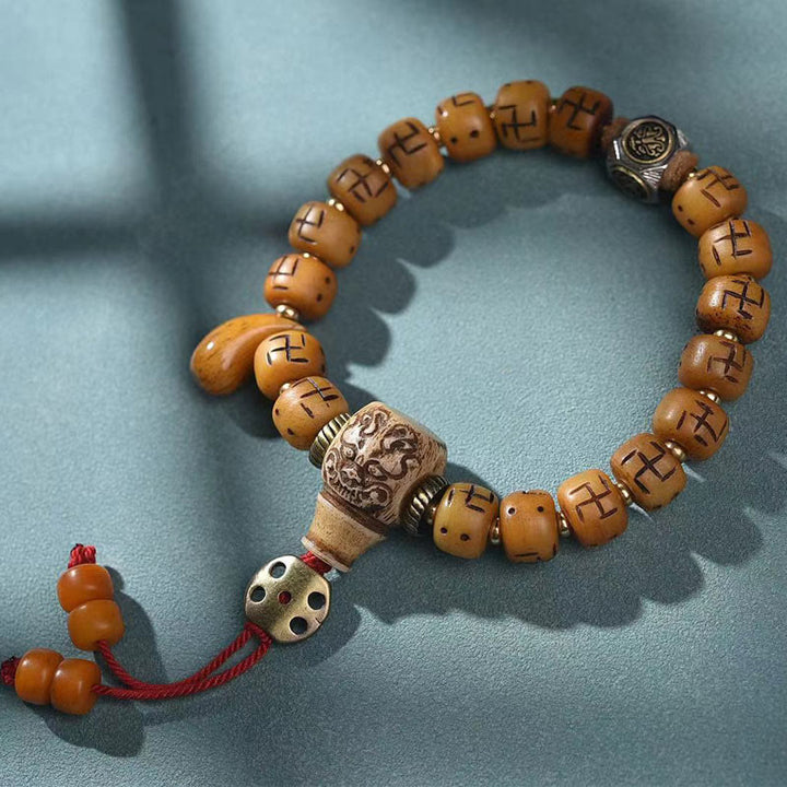Buddha Stones en os de chameau tibétain naturel, croix gammée Dzi, perle Shankha, breloque de bouddha Kirtimukha, Bracelet à pompon de Protection porte-bonheur