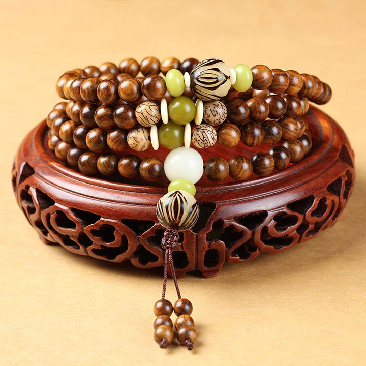Bracelet Mala tibétain en bois de rose et Buddha Stones pour la protection et le calme - 10 mm x 108 - image 0