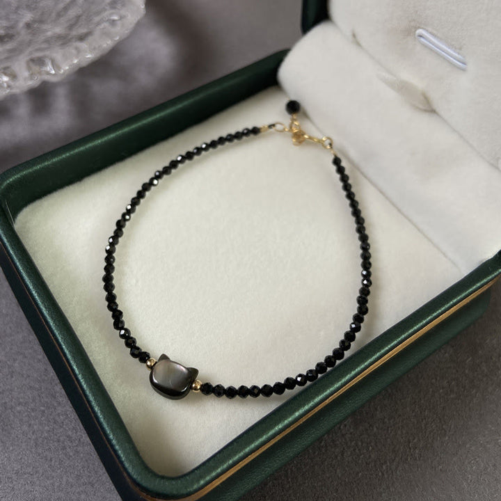 Bracelet de guérison en pierre tridacna avec spinelle noire et cristal blanc plaqué or 14 carats de Buddha Stones - image 2