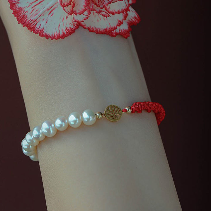Bracelet tressé en fil rouge avec perles de protection et de chance plaquées or 14 carats