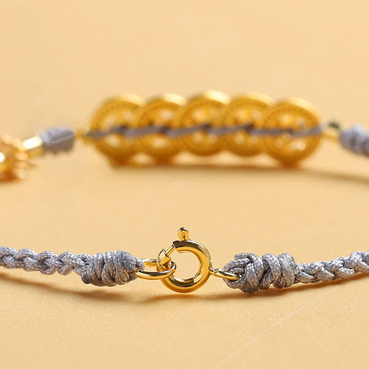 Bracelet tressé en corde bleue avec perles et arbre de fortune en cuivre et Buddha Stones