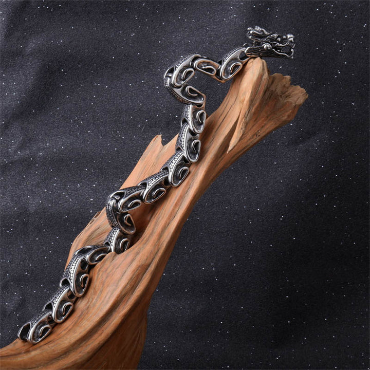 Bracelet porte-bonheur en acier titane et dragon