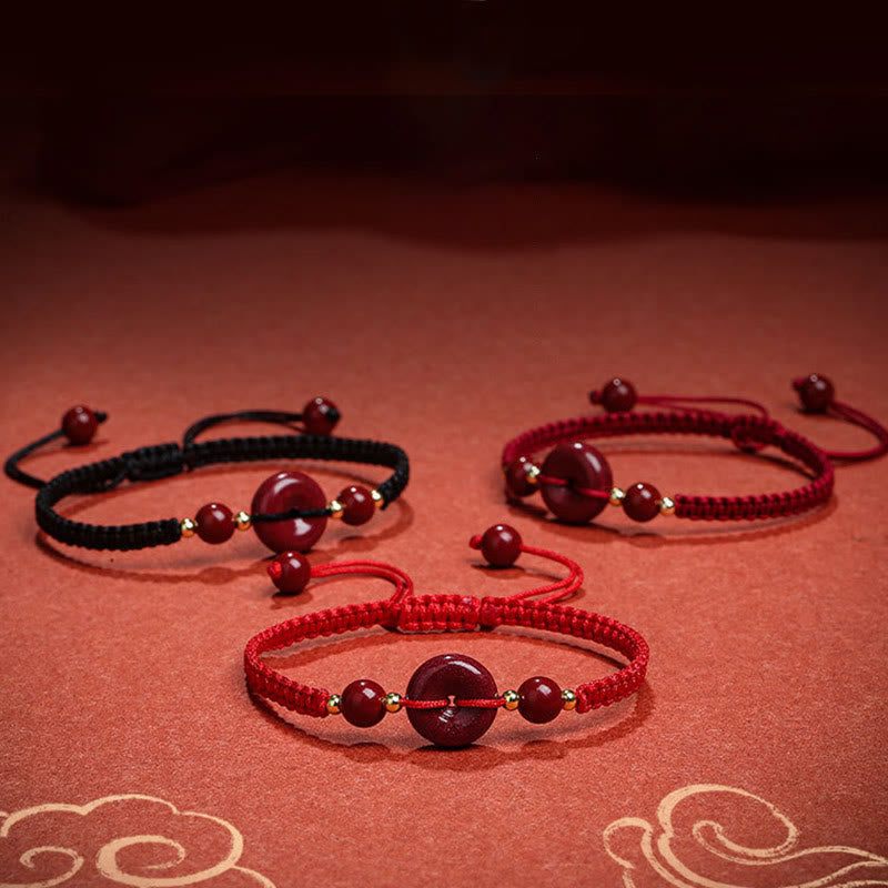 Bracelet de bénédiction en corde avec boucle de paix en cinabre naturel et Buddha Stones