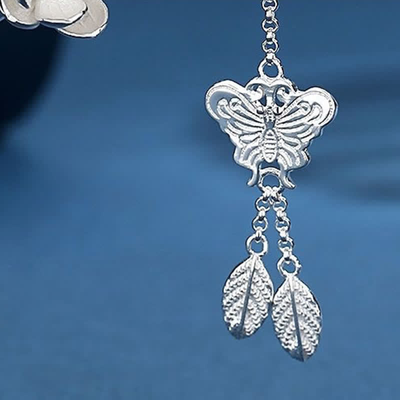 Épingle à cheveux à pompon en forme de papillon et de fleur de prunier - image 6