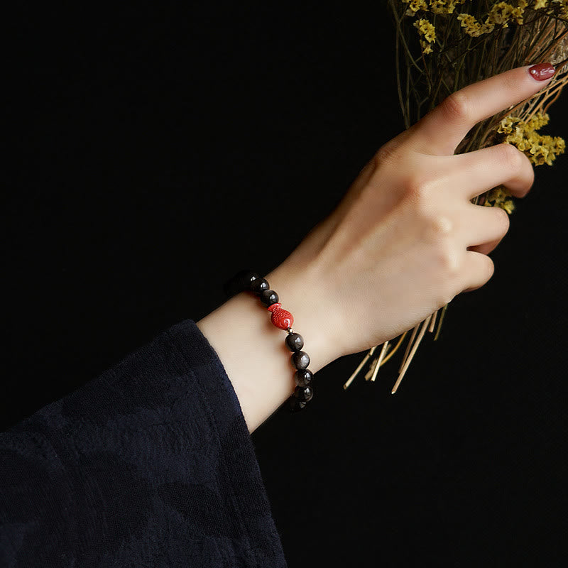 Bracelet de protection apaisante en obsidienne et cinabre avec Buddha Stones et reflets argentés naturels