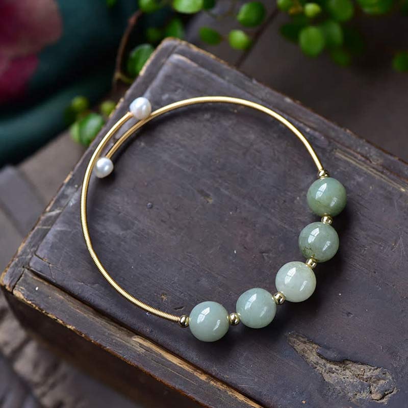 Bracelet jonc en jade avec Buddha Stones et bénédictions pour la chance et l'abondance