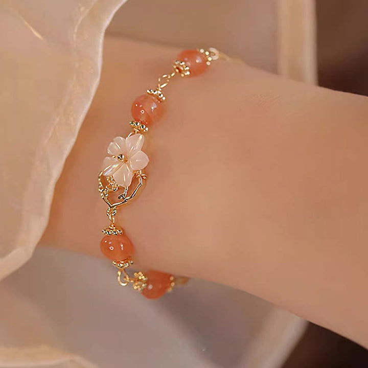 Bracelet de confiance en forme de fleur en pierre d'agate rouge Tridacna de Buddha Stones