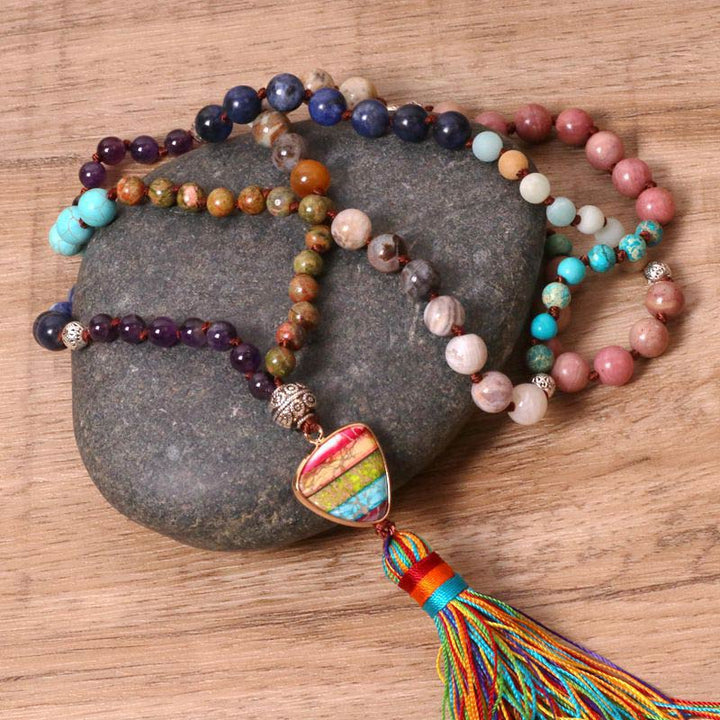 Collier d'équilibre en jaspe zèbre, turquoise, lazurite et tibétain
