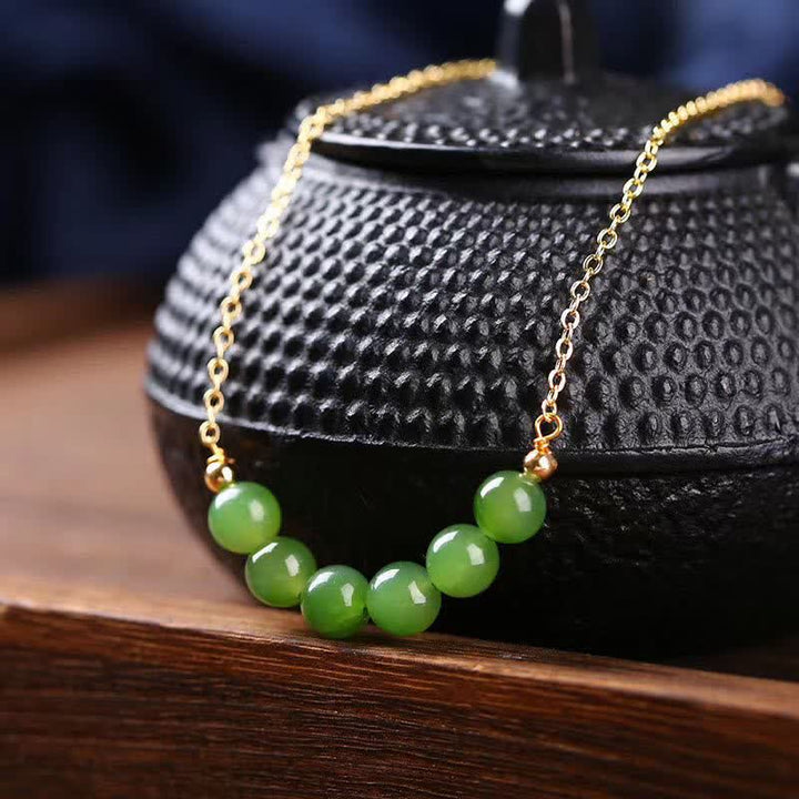 Collier avec pendentif porte-bonheur en perles de jade cyan Hetian plaqué or 14 carats