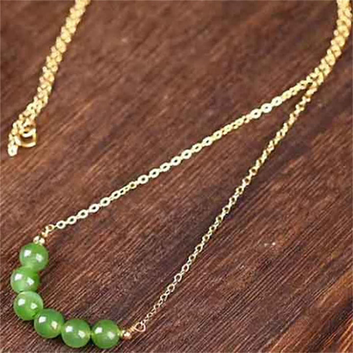 Collier avec pendentif porte-bonheur en perles de jade cyan Hetian plaqué or 14 carats