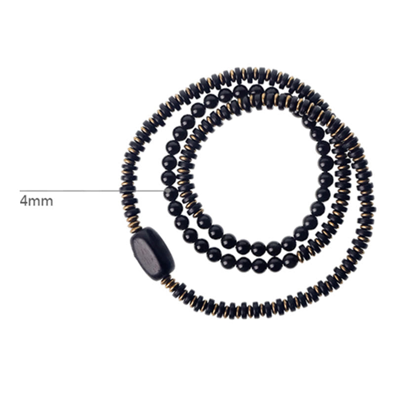 Bracelet triple tour de guérison en cuivre et bois d'ébène avec Buddha Stones arc-en-ciel et obsidienne