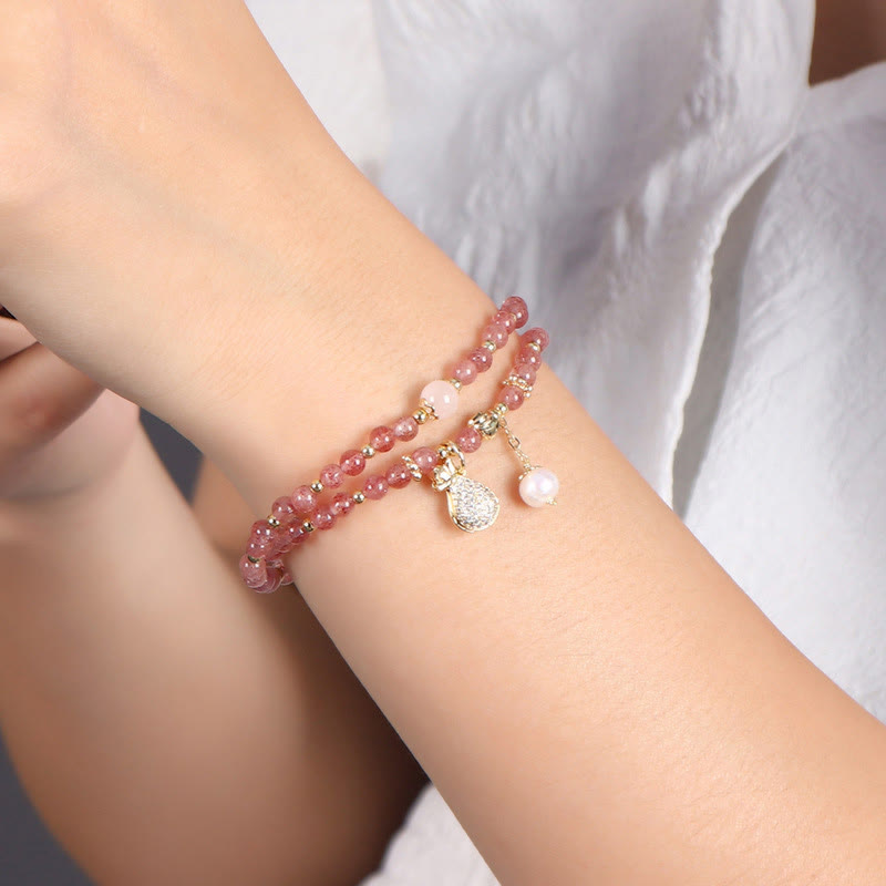 Bracelet double tour avec breloque positive et Buddha Stones en quartz fraise