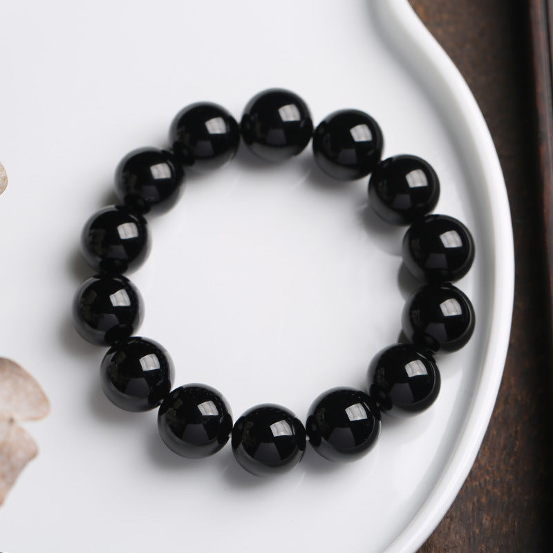 Bracelet porte-bonheur en onyx noir naturel Buddha Stones