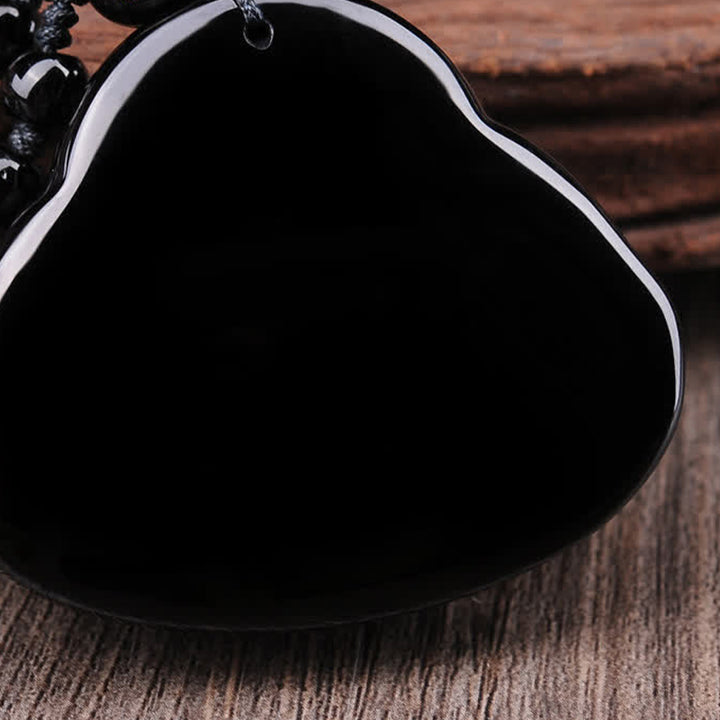 Collier pendentif Bouddha rieur en obsidienne noire transformant Buddha Buddha Stones