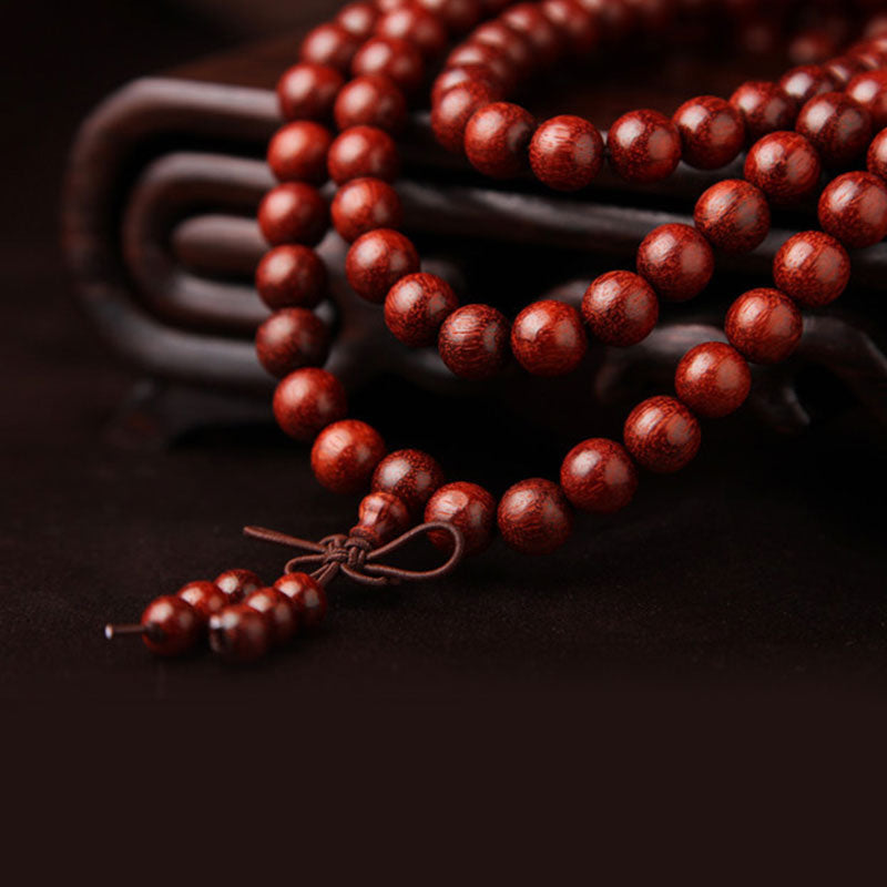 Bracelet de méditation Buddha Stones à petites feuilles en bois de santal rouge avec 108 perles