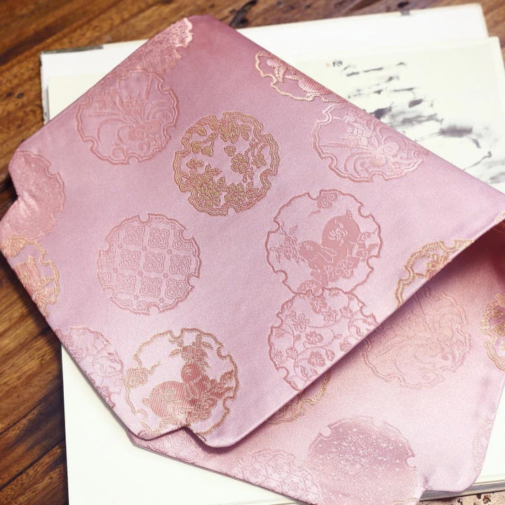 Dessous de verre élégant à motif de brocart floral pour tasse à thé