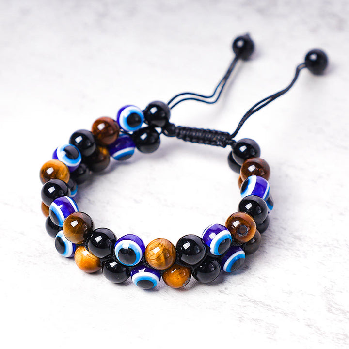 Bracelet de perles de protection contre le mauvais œil en hématite et œil de tigre Buddha Stones