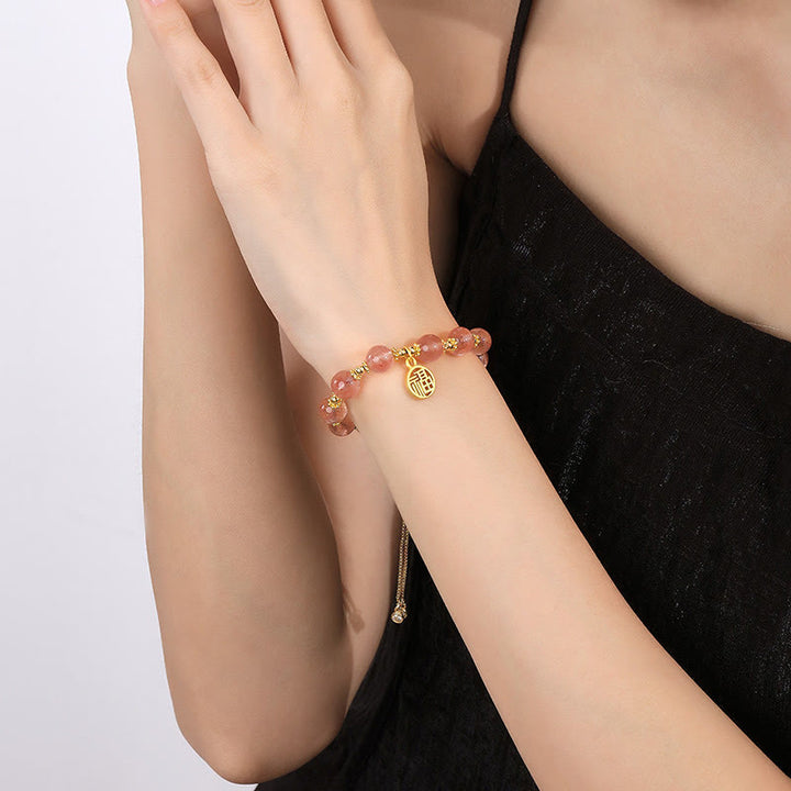Bracelet à breloques positives en quartz fraise naturel plaqué or 14 carats de Buddha Stones
