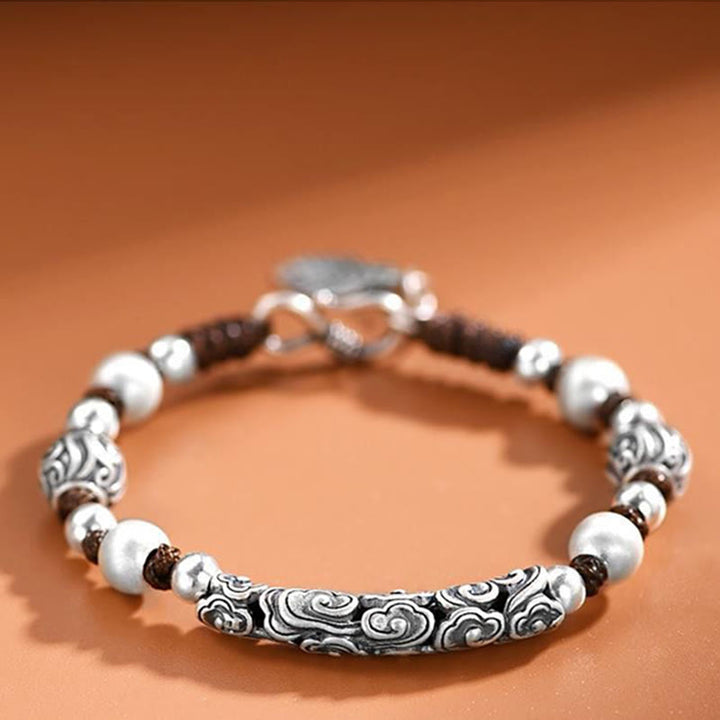 Bracelet en fil de richesse en argent sterling 999 fait main en cuivre et Buddha Stones du Tibet