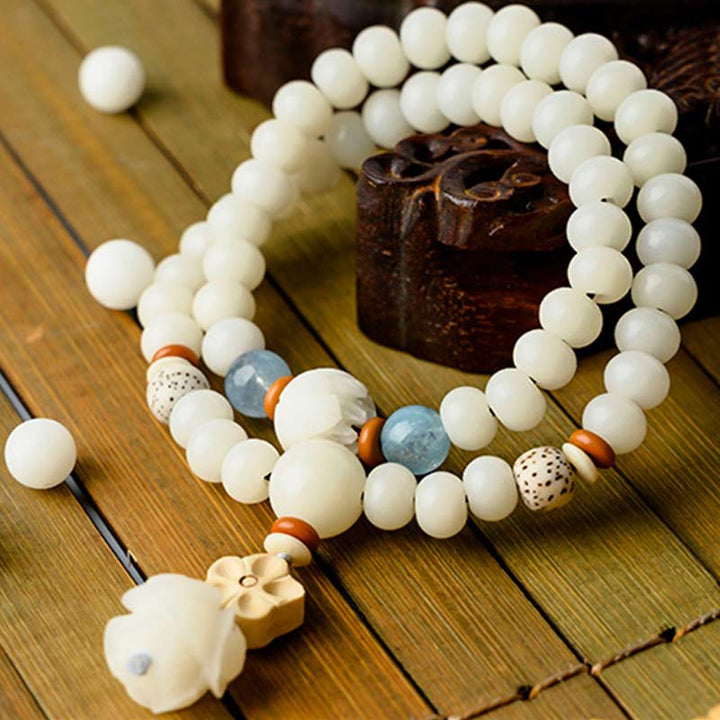 Bracelet de bénédiction Bodhi Lotus en jade blanc tibétain Buddha Stones