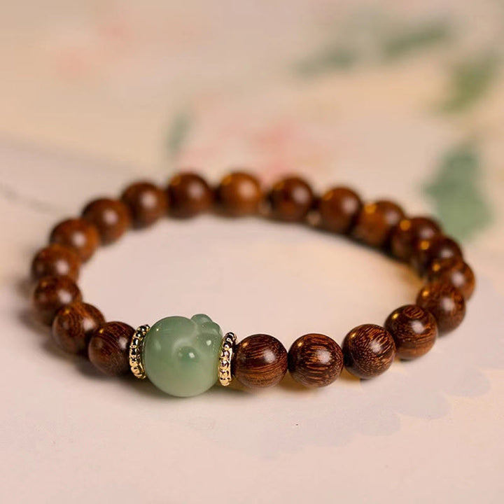 Bracelet de protection pour pattes de chat en bois de santal et Buddha Stones - image 2