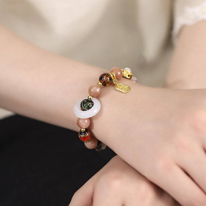 Buddha Stones Encens tibétain Cendres Verre Liuli Pierre Tridacna Pierre de Soleil Om Mani Padme Hum Bracelet à breloques pour roue de prière