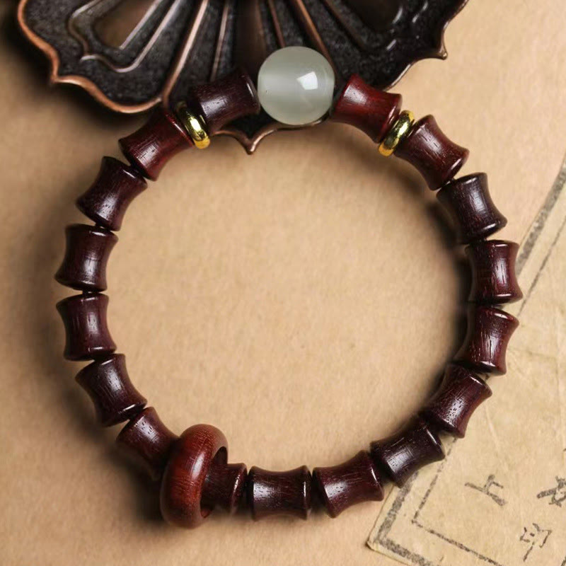 Bracelet de paix en bambou et bois de santal vert et ébène avec Buddha Stones