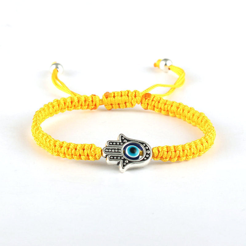 Bracelet en corde fait main avec symbole Hamsa et Buddha Stones