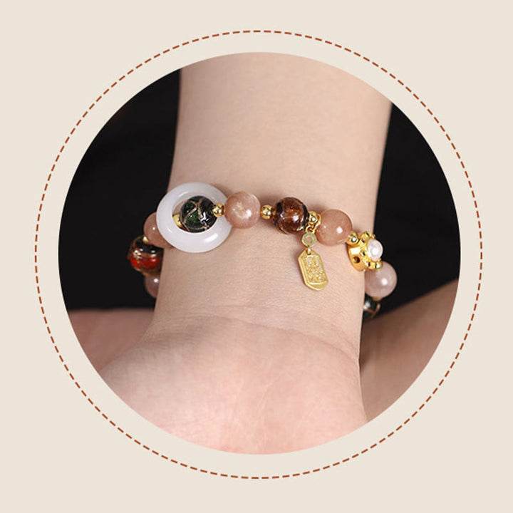 Buddha Stones Encens tibétain Cendres Verre Liuli Pierre Tridacna Pierre de Soleil Om Mani Padme Hum Bracelet à breloques pour roue de prière