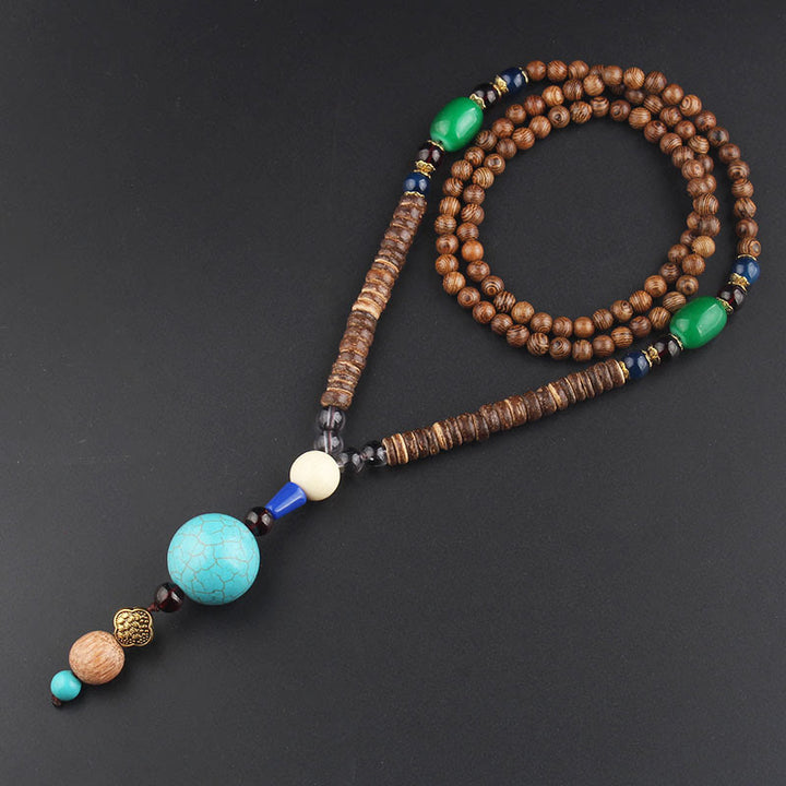Collier pendentif en Buddha Stones tibétain en bois de wengé Bodhi Seed Agate Balance Peace