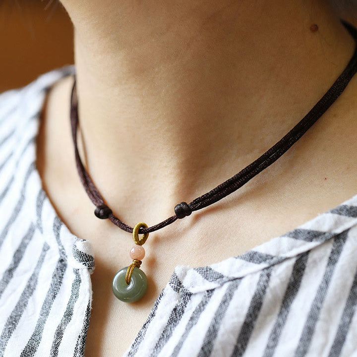 Collier avec pendentif en jade rond naturel et Buddha Stones, boucle de paix, lotus d'abondance - Brun - Boucle de la paix - image 10