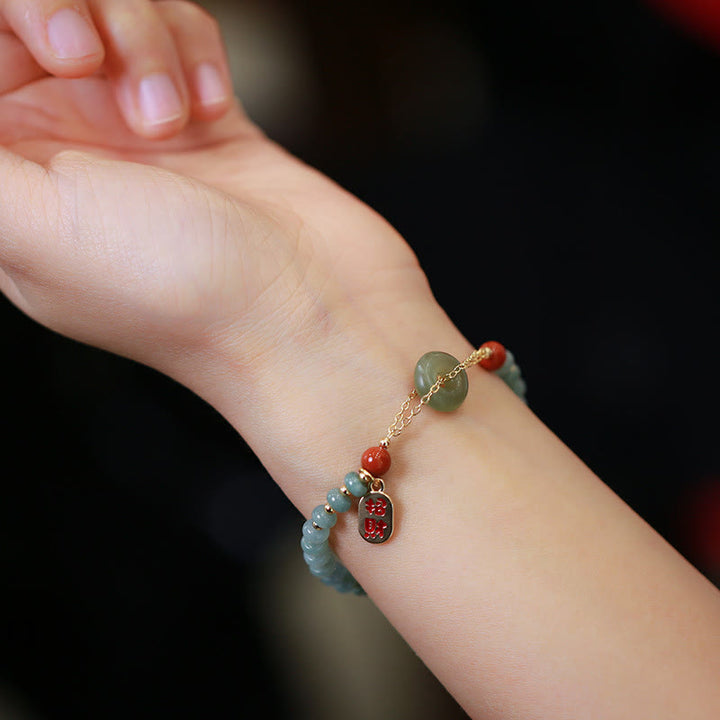 Bracelet porte-bonheur en Buddha Stones naturel Hetian et agate rouge avec boucle de paix