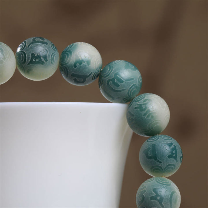 Bracelet gravé en Buddha Stones graines de Bodhi Om Mani Padme Hum pour éloigner les mauvais esprits
