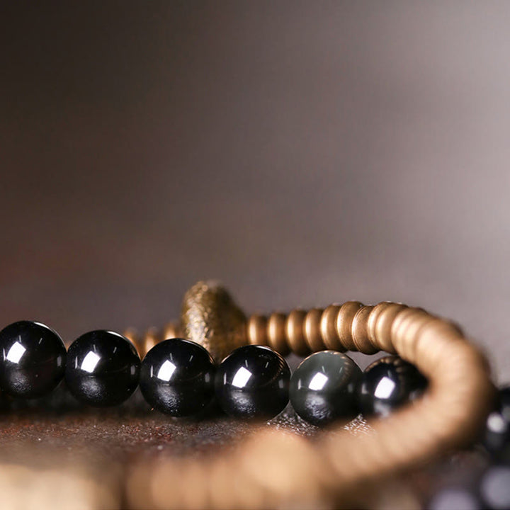 Bracelet double couche de guérison de la paix intérieure en cuivre et obsidienne arc-en-ciel en Buddha Stones
