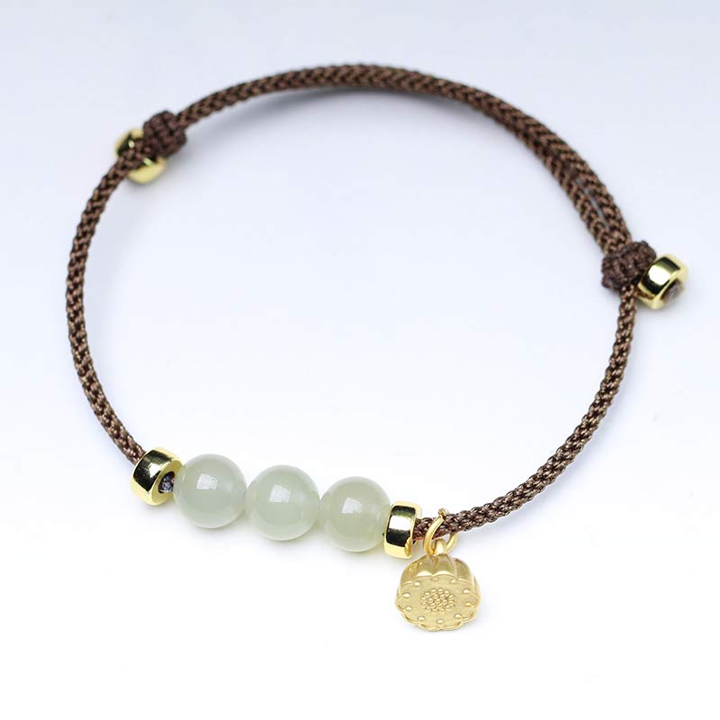 Bracelet tissé en fil rouge avec des Buddha Stones et des graines de lotus en jade naturel