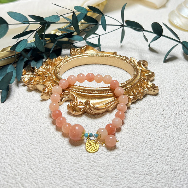 Bracelet porte-bonheur en Buddha Stones orange naturelle turquoise avec personnage Fu