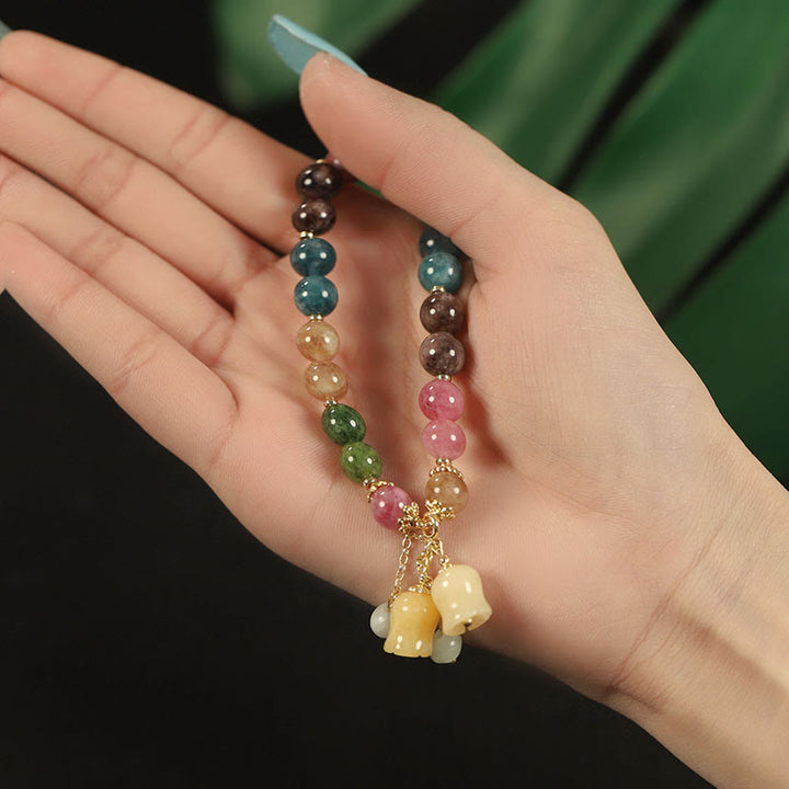 Bracelet d'amour en perles de fleur de tourmaline colorée naturelle Buddha Stones