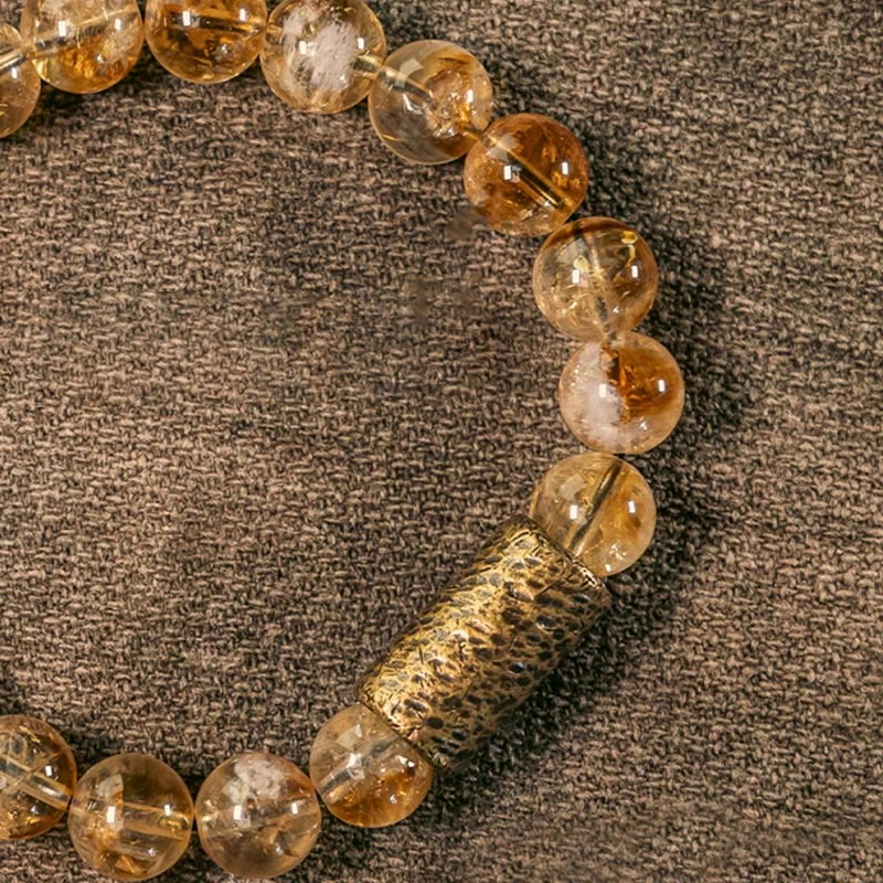 Bracelet de protection en perles de cristal de citrine naturelle et de laiton Buddha Stones