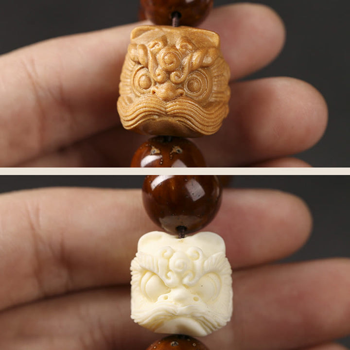 Bracelet de sagesse du lion dansant en Buddha Stones et graines de Bodhi violettes