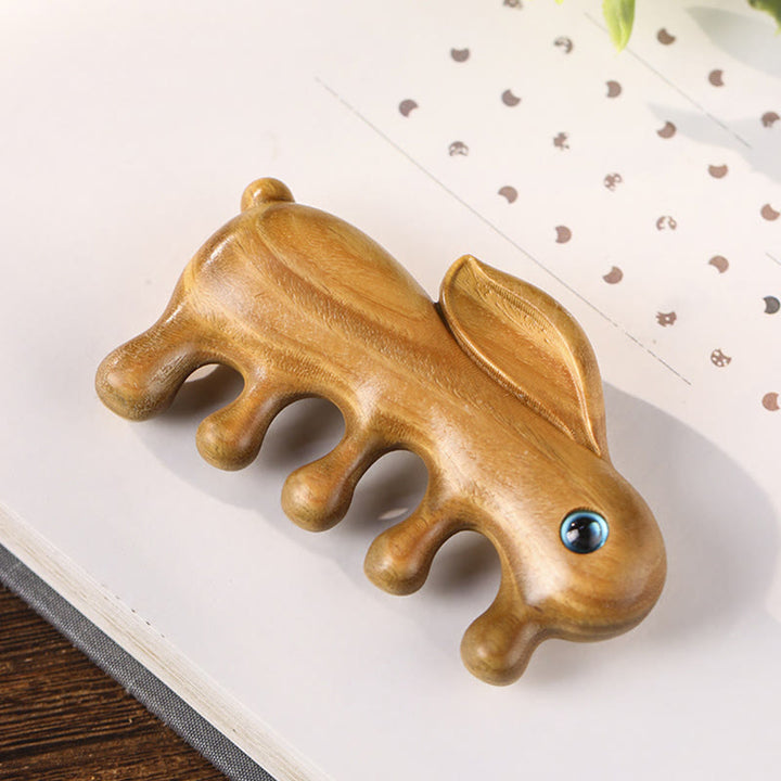 Peigne de massage relaxant en forme de lapin en bois de santal rouge et vert à petites feuilles