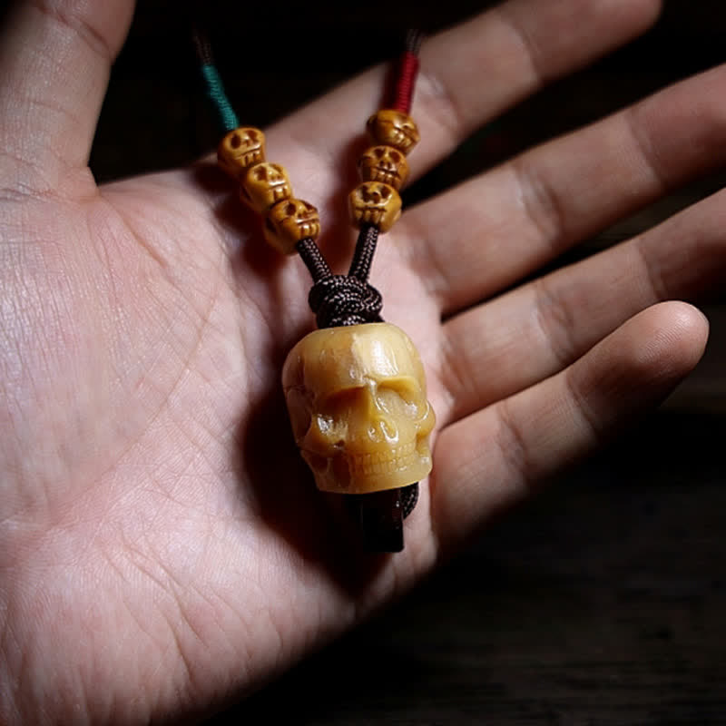 Collier pendentif en os de chameau tibétain Buddha Stones et crâne du Seigneur des cadavres