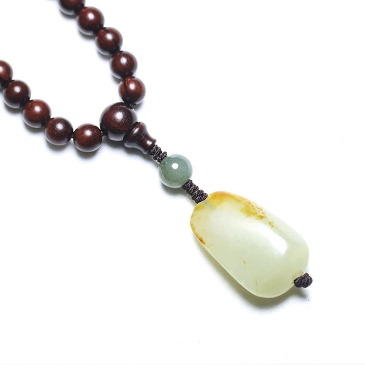 Bracelet de méditation Mala tibétain en jade et bois de santal rouge à petites feuilles avec Buddha Stones
