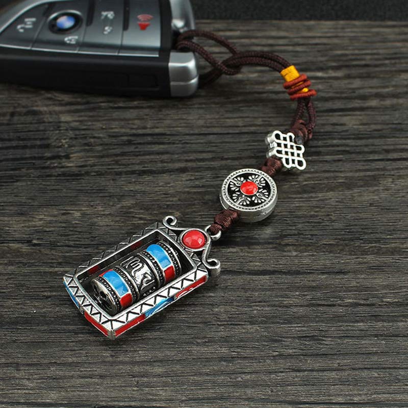 Porte-clés décoratif avec nœud rotatif et bénédiction en forme de roue de prière en six mots vrais en Buddha Stones