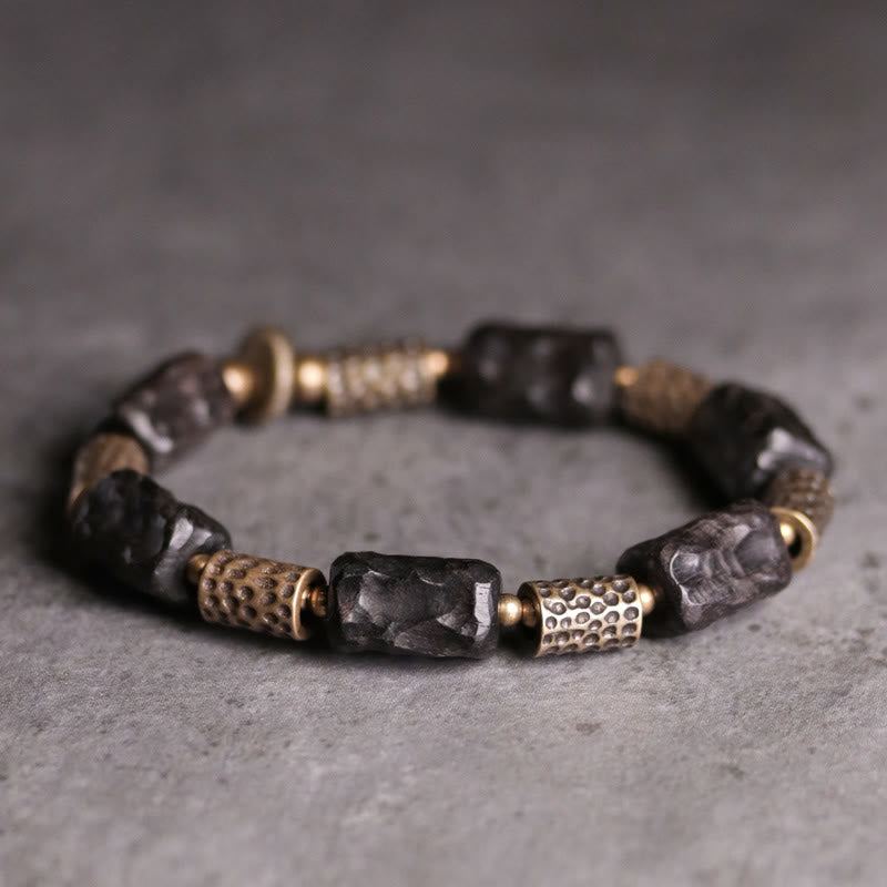 Bracelet tibétain en bois d'ébène et cuivre avec Buddha Stones pour la paix et le calme