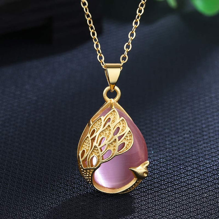 Collier pendentif en cuivre et calcédoine verte et cristal rose avec pendentif apaisant