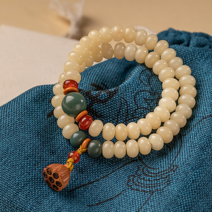 Bracelet double tour avec breloque en forme de gousse de lotus et graines de Bodhi et Buddha Stones