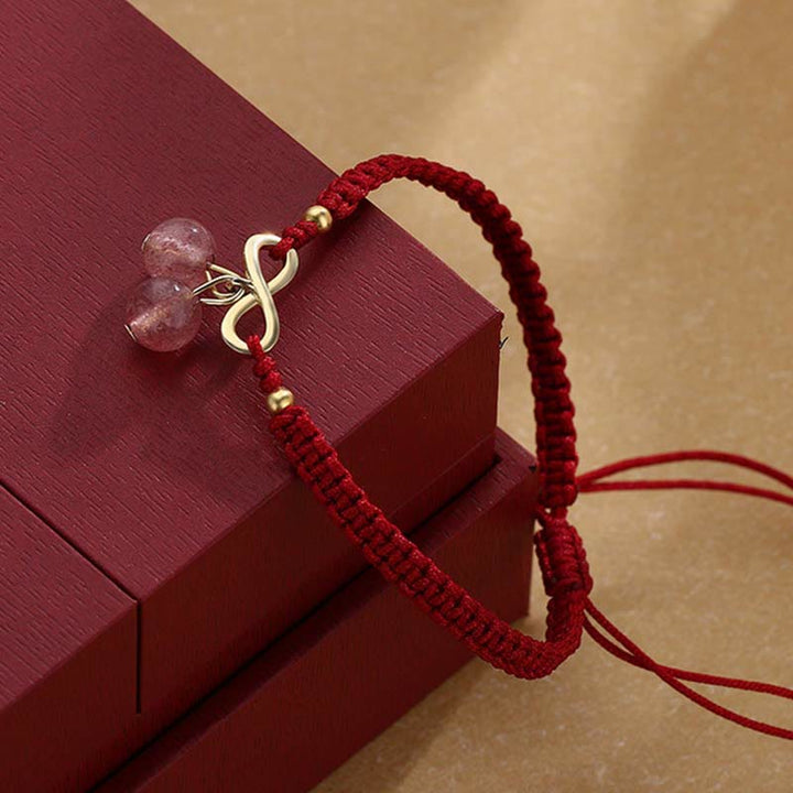 Bracelet tissé en fil rouge avec nœud sans fin en cristal de quartz fraise et Buddha Stones