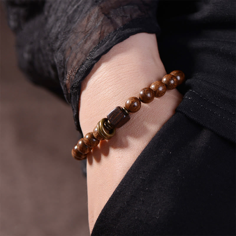 Bracelet de spiritualité en bois de Phoebe Zhennan Buddha Stones